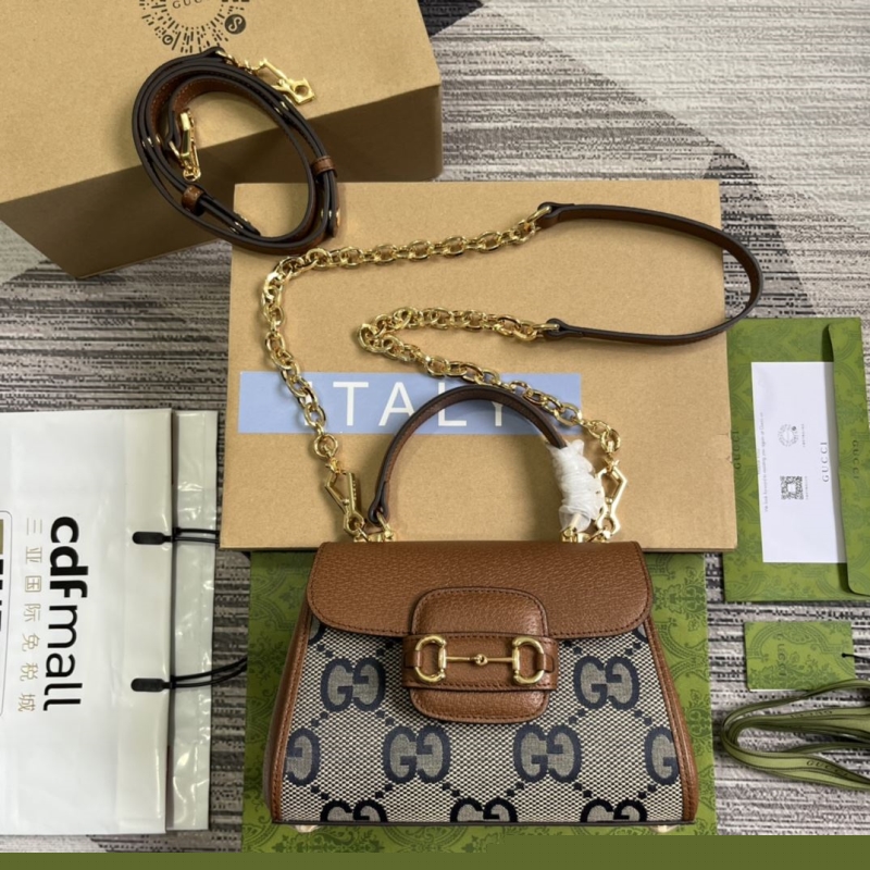 G*u*i top handle bags